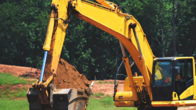 A yellow construction earth mover.