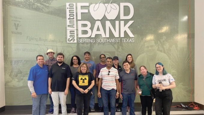 Group picture in front of San Antonio Food Bank