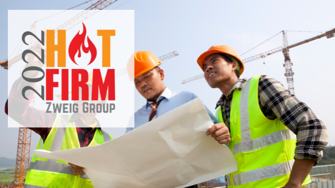 2022 hot firm award with construction workers in the background.
