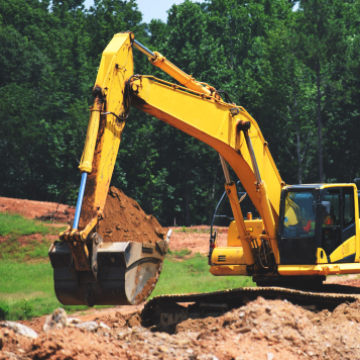 A yellow construction earth mover.